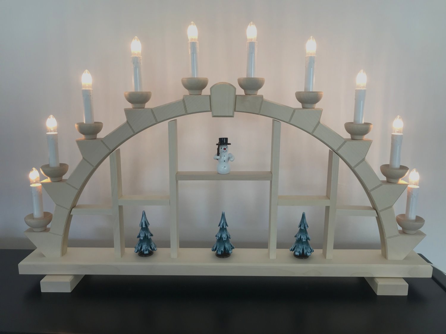 Candle arch Erzgebirge wood natural 10 electric candles display case 64x40 cm with snowman + trees