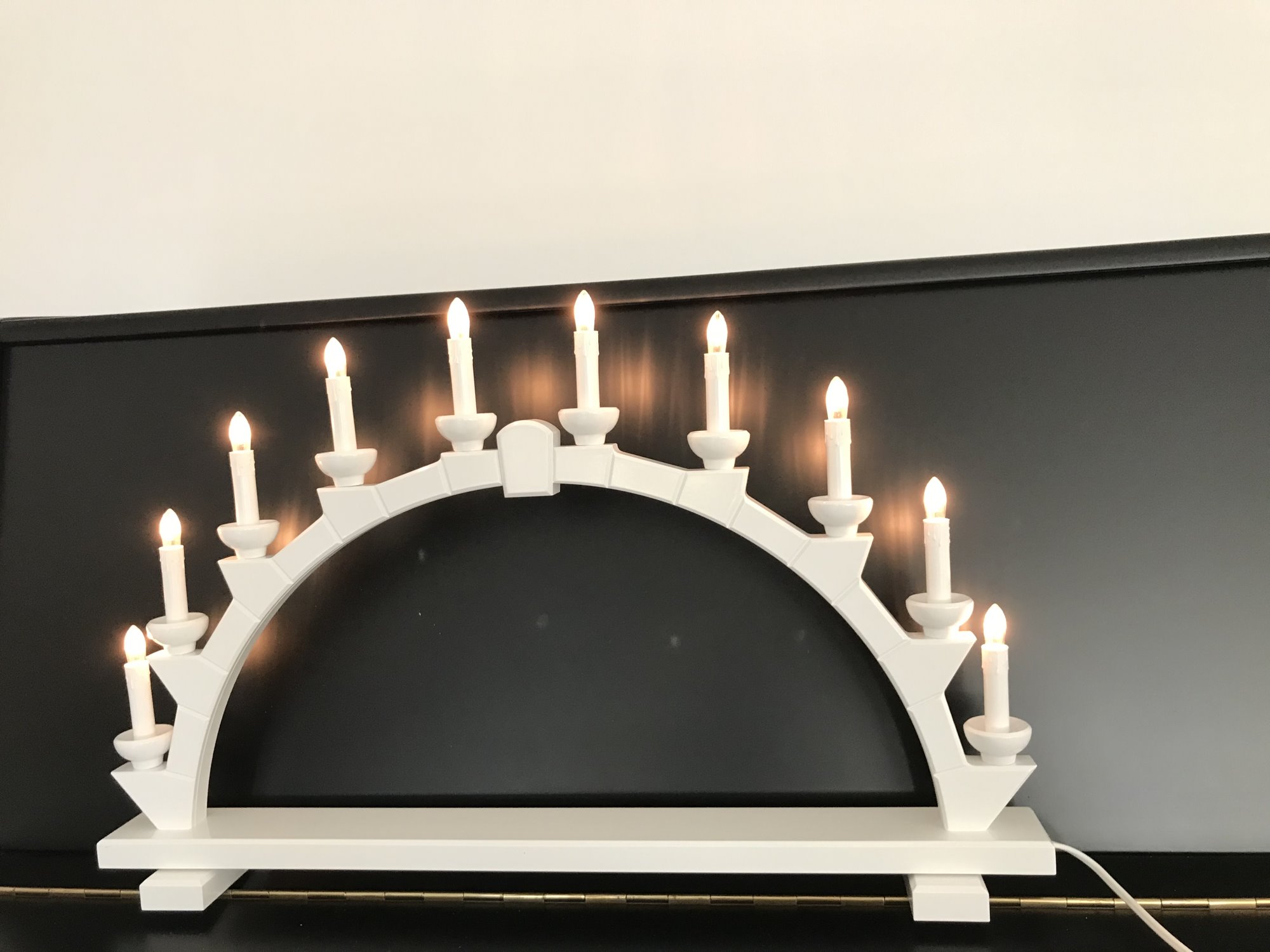 Schwibbogen aus Holz weiss mit 10 elekr. Kerzen - 64x40 cm
