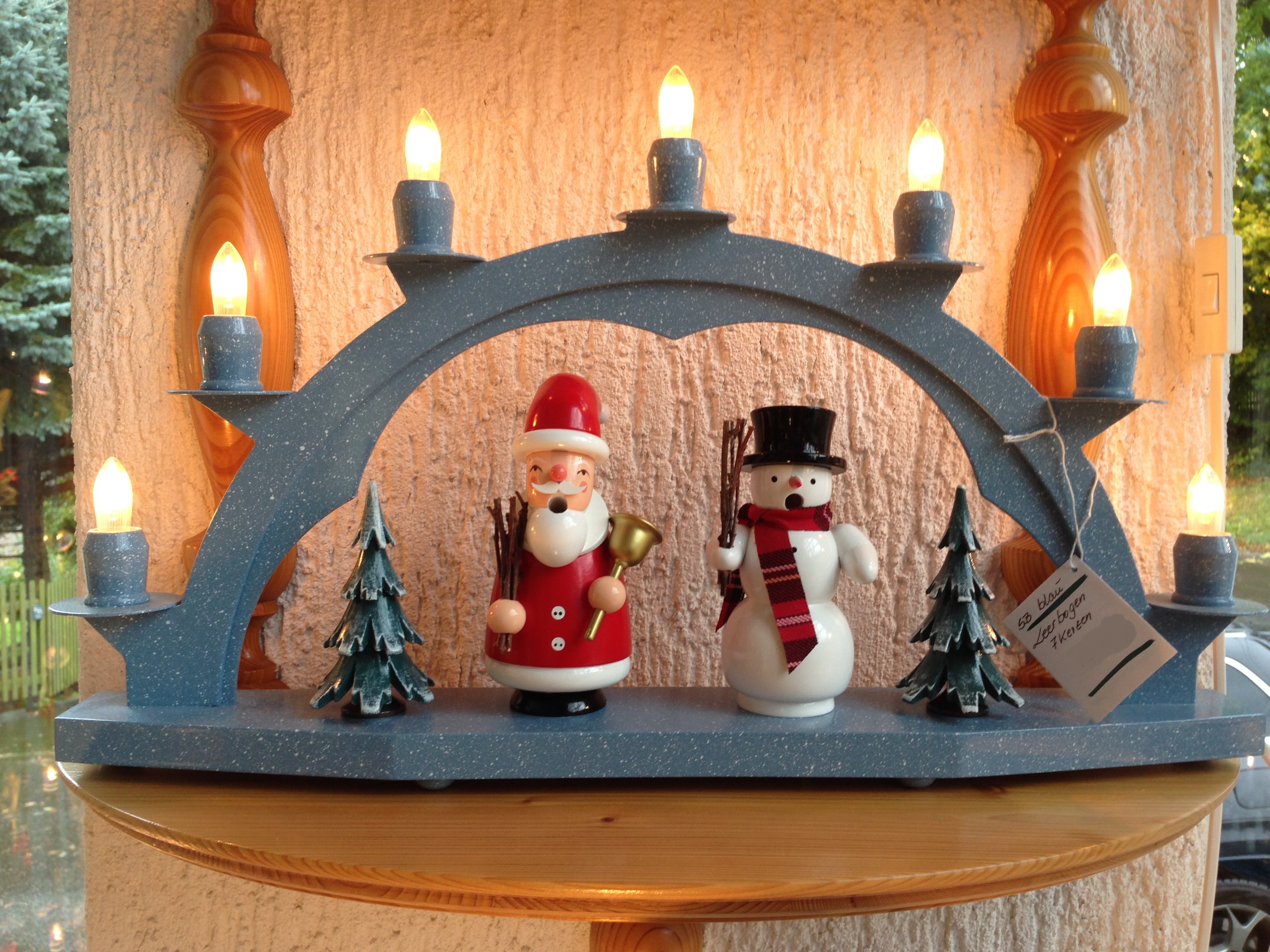 Sparkling arch from the Erzgebirge made of blue wood with 7 electric candles Candles without case - 47 x 28cm